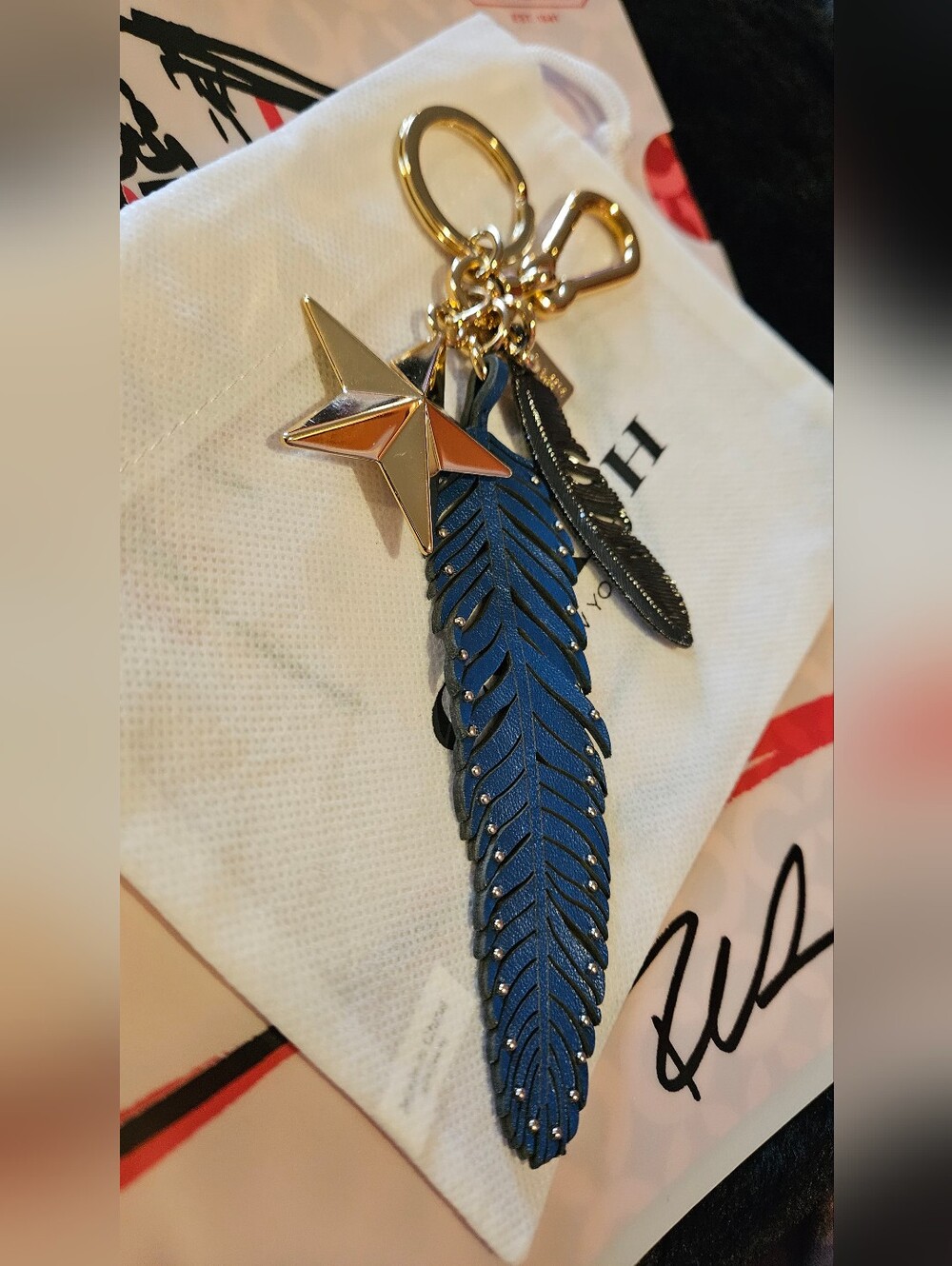 Coach Blue Leather Feather Keychain with Gold Star Charm - Picture 2 of 5